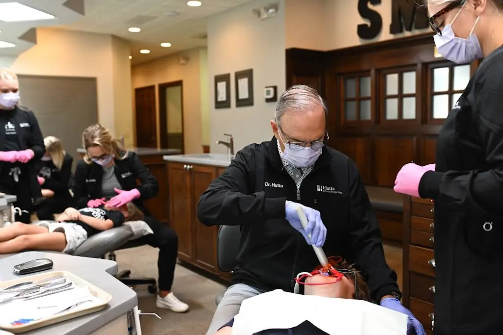 Hutta Orthodontic Specialists - Professional dental clinic exterior with modern facilities