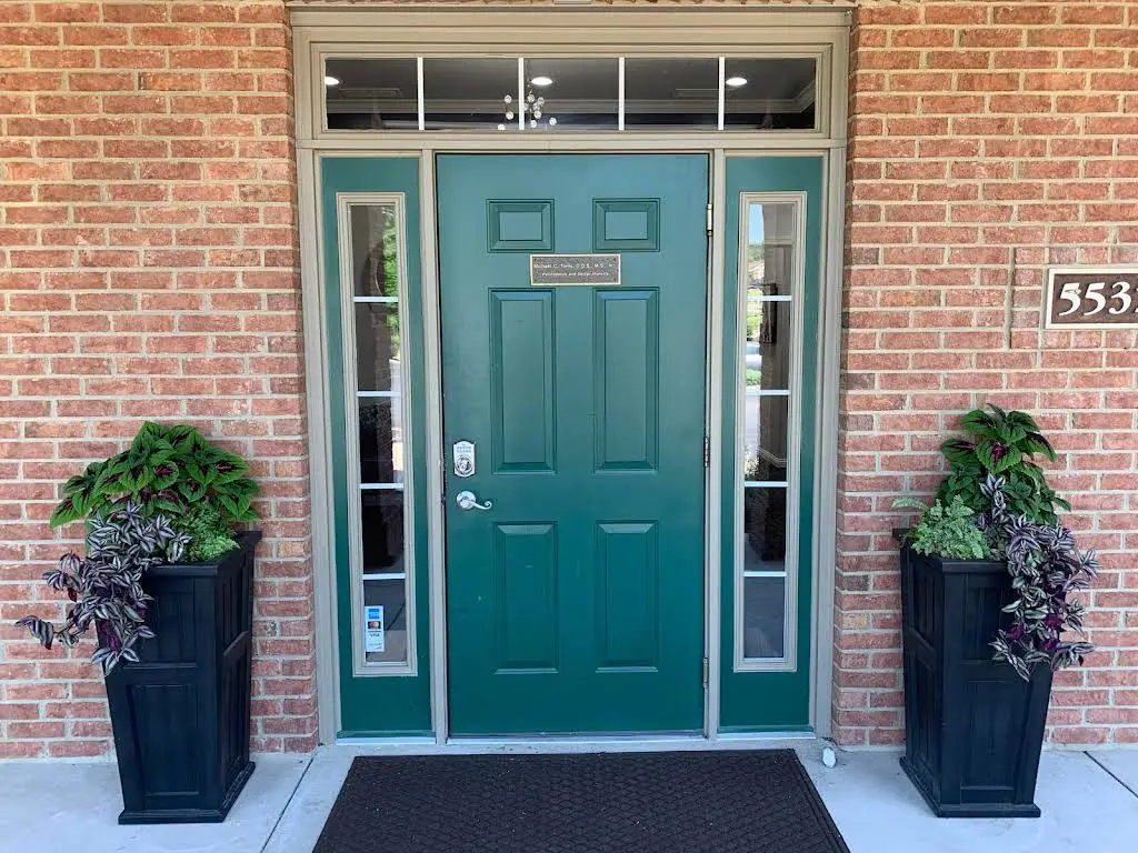 Michael C. Toms D.D.S., M.S., Inc. - Professional dental clinic exterior with modern facilities