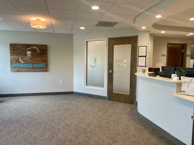 Southern Roots Periodontics - Professional dental clinic exterior with modern facilities
