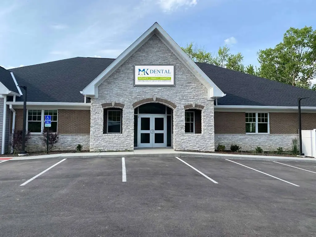 MK Dental Excellence - Professional dental clinic exterior with modern facilities