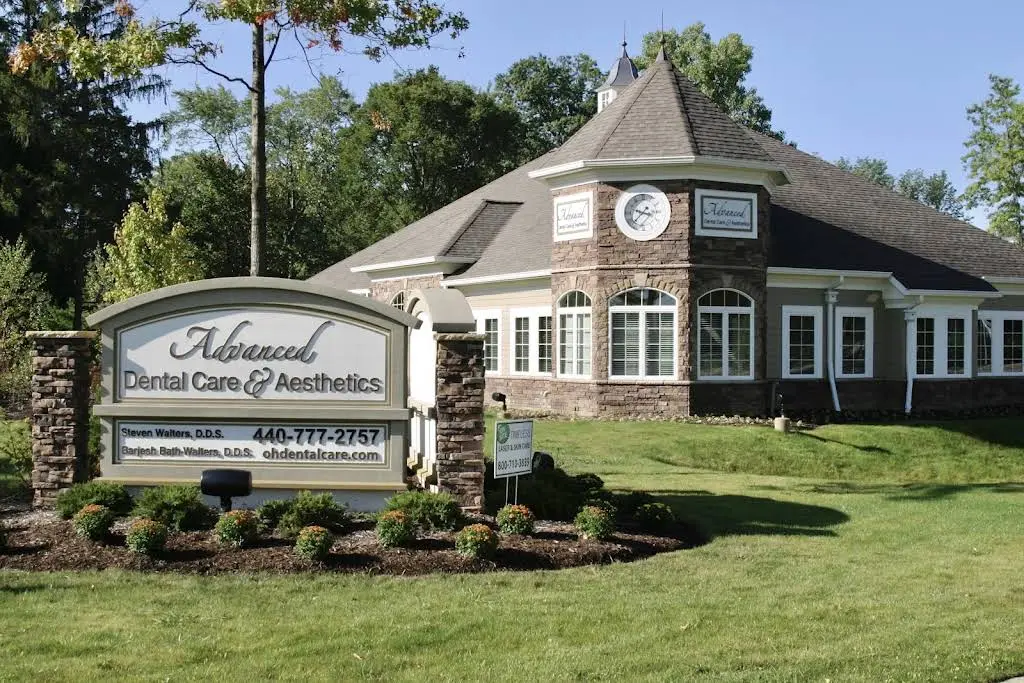 Advanced Dental Care & Aesthetics - Professional dental clinic exterior with modern facilities