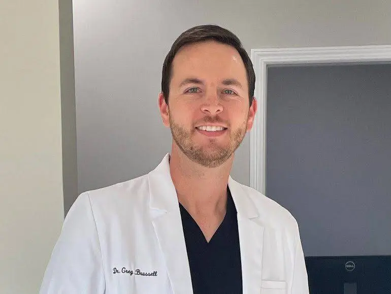 Louisville Dentures and Implants - Professional dental clinic exterior with modern facilities