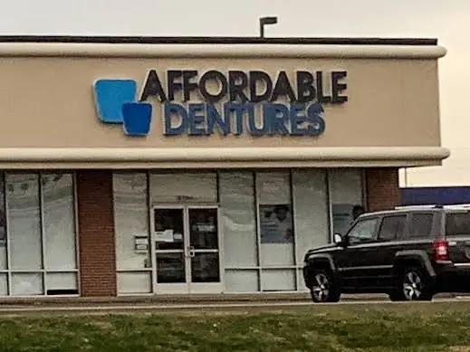 Affordable Dentures & Implants - Professional dental clinic exterior with modern facilities