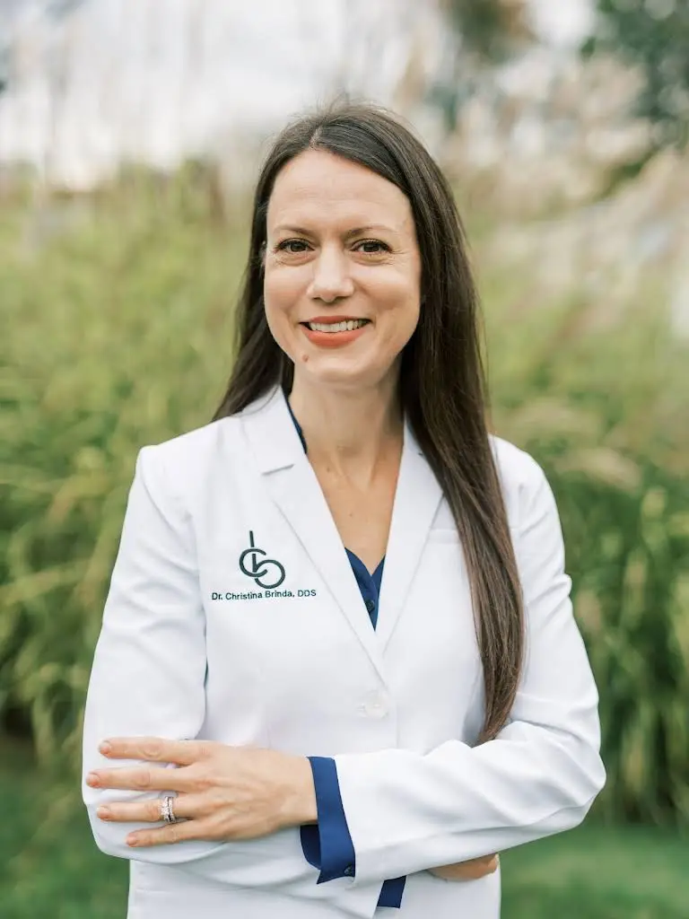 Christina Brinda DDS - Professional dental clinic exterior with modern facilities