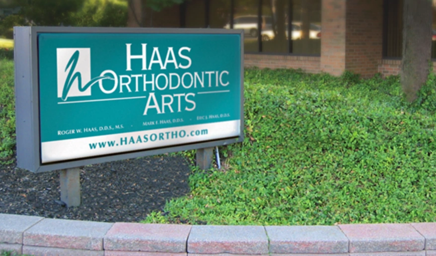 Haas Orthodontic Arts - Professional dental clinic exterior with modern facilities