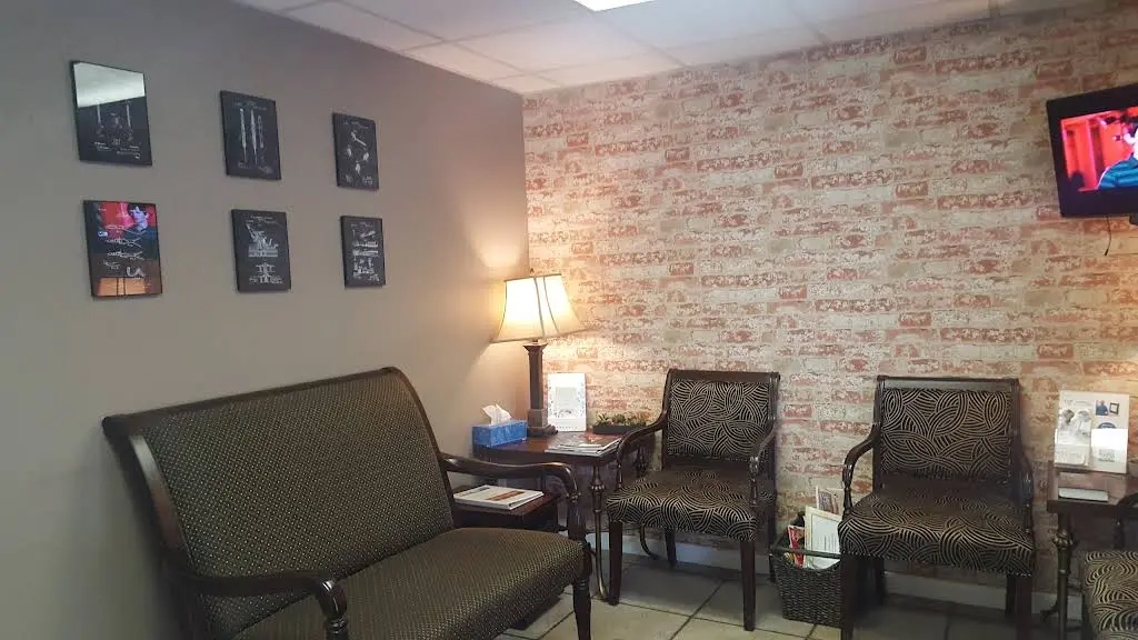 Andrew G. Couch, DMD - Professional dental clinic exterior with modern facilities