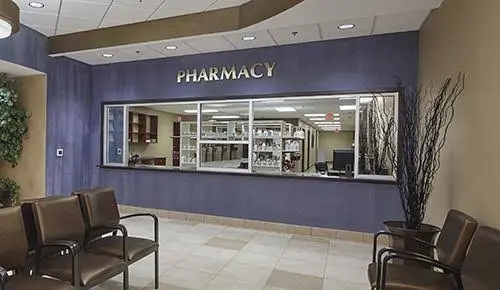 Pharmacy Care Center - Professional dental clinic exterior with modern facilities