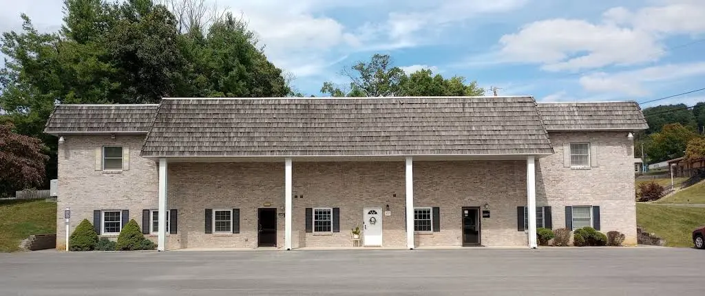 Hollyfield & Perkins - Professional dental clinic exterior with modern facilities