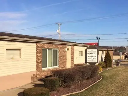 Dentistry For Children & Teens Inc. - Professional dental clinic exterior with modern facilities