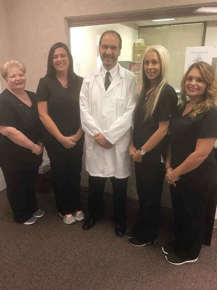 Premier Dental: Frank W. Angotti DDS - Professional dental clinic exterior with modern facilities
