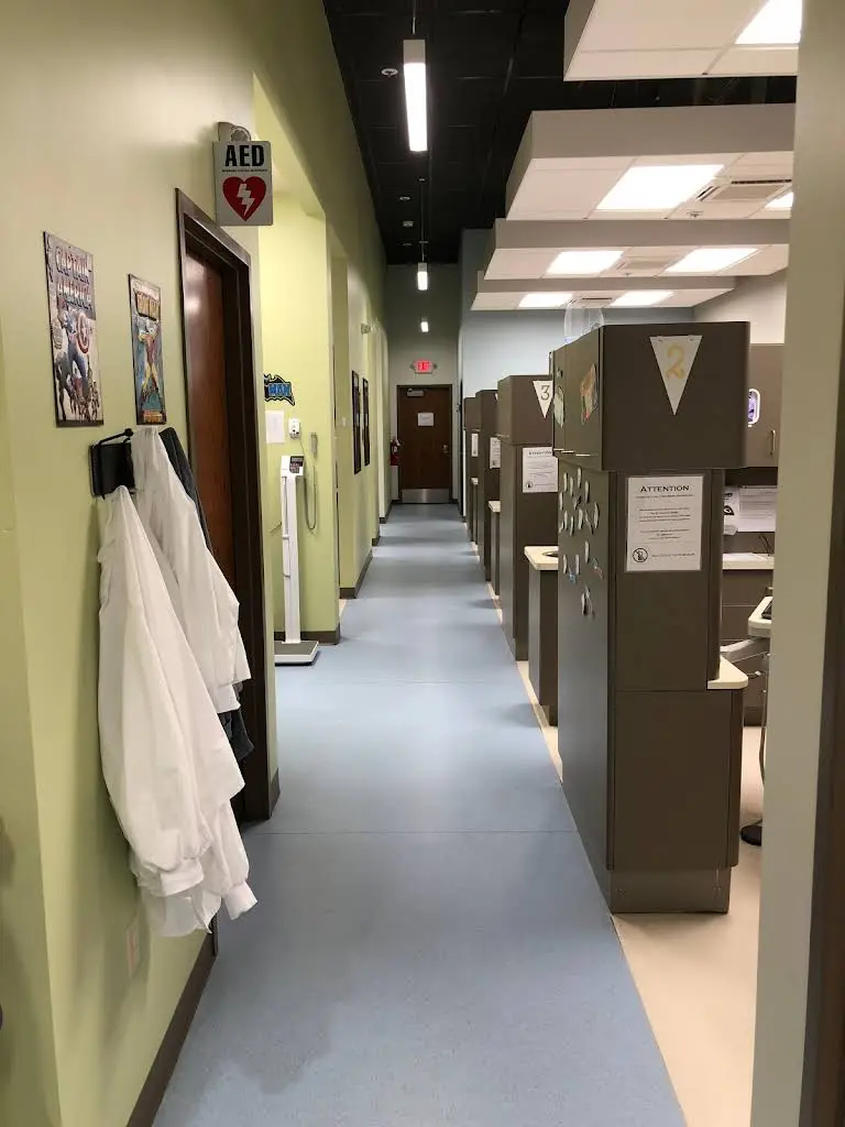 Compass Health Network - Professional dental clinic exterior with modern facilities