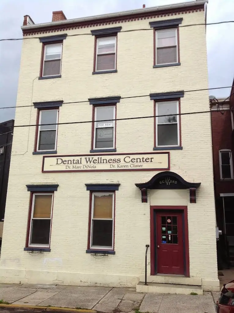 Dental Wellness Center - Professional dental clinic exterior with modern facilities