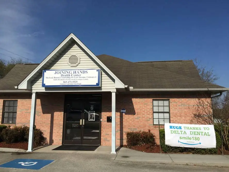 Joining Hands Health Center - Professional dental clinic exterior with modern facilities