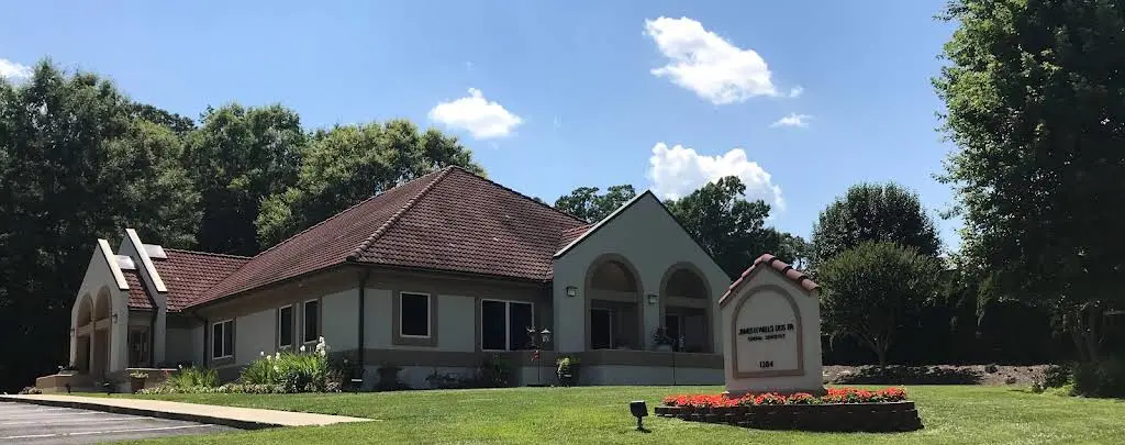 James H. Wells, DDS, PA - Professional dental clinic exterior with modern facilities