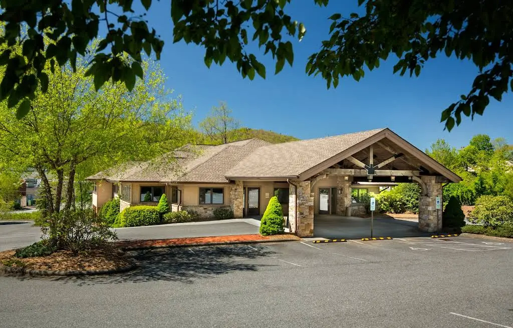 OP Smiles - Professional dental clinic exterior with modern facilities