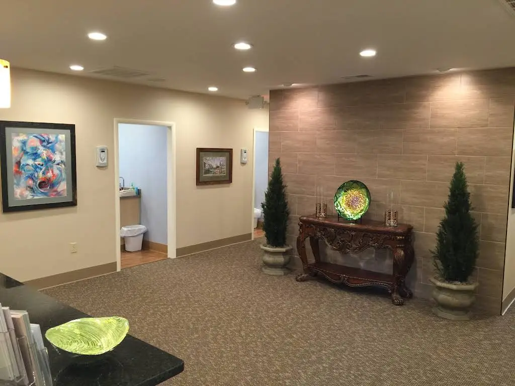 Aaron Periodontics and Dental Implants - Professional dental clinic exterior with modern facilities