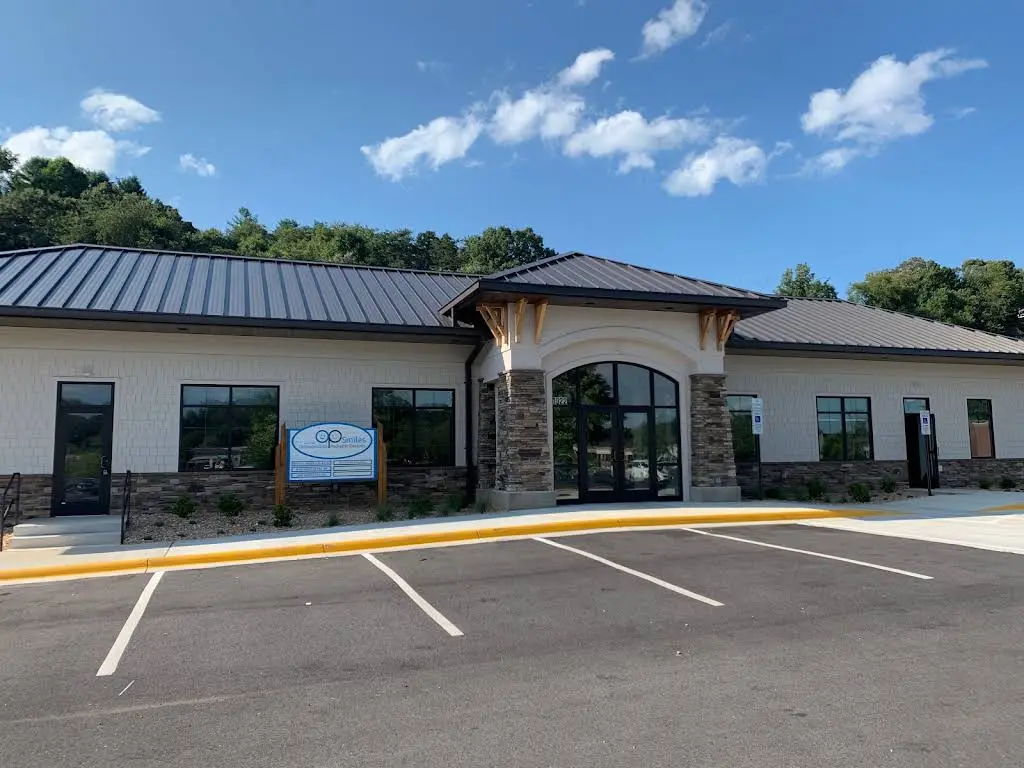 OP Smiles - Professional dental clinic exterior with modern facilities