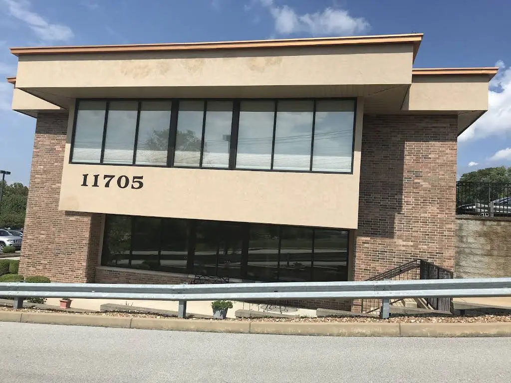 Dr. John Martin & Associates - Professional dental clinic exterior with modern facilities