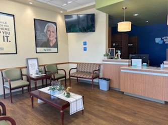 Affordable Dentures & Implants - Professional dental clinic exterior with modern facilities