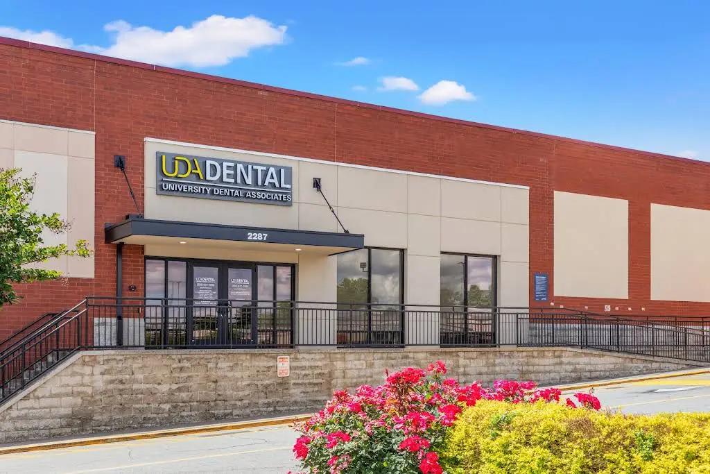 University Dental Associates Comp Rehab - Professional dental clinic exterior with modern facilities