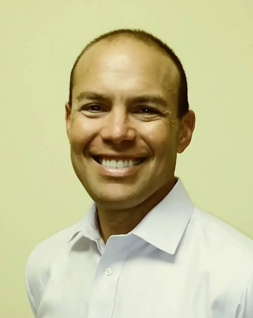 Michael C. Cordora, DDS, AGD Fellow - Professional dental clinic exterior with modern facilities