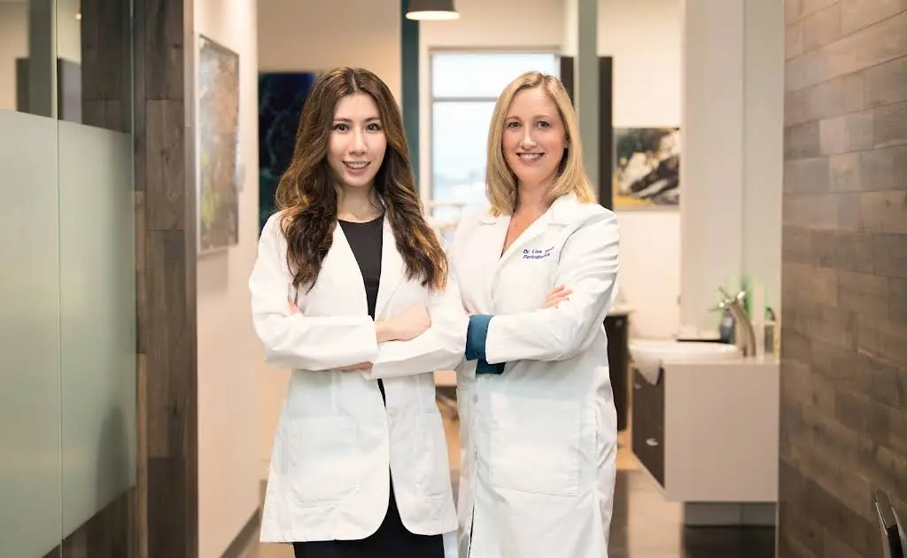 Advanced Implants & Periodontics; Dr. Melanie Towe PA - Professional dental clinic exterior with modern facilities