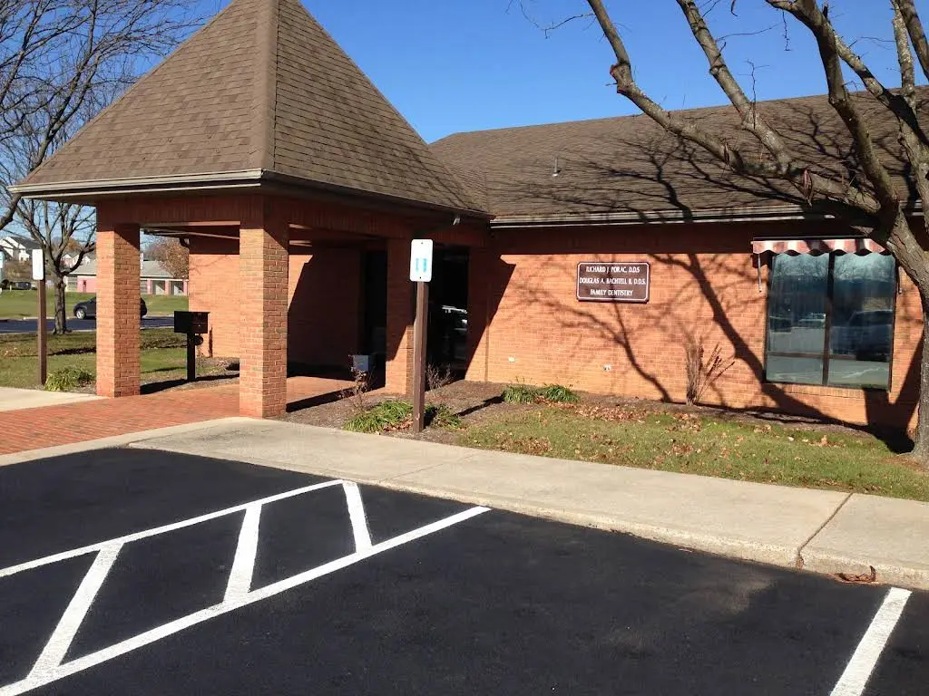Drs. Porac & Bachtell - Professional dental clinic exterior with modern facilities