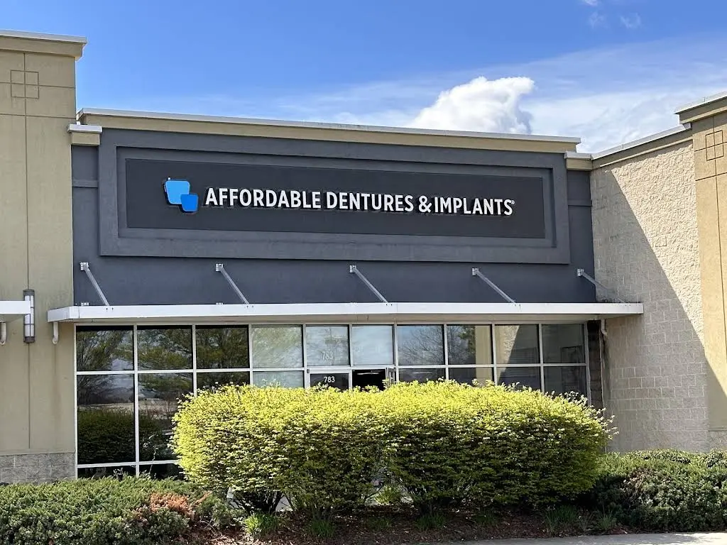 Affordable Dentures & Implants - Professional dental clinic exterior with modern facilities