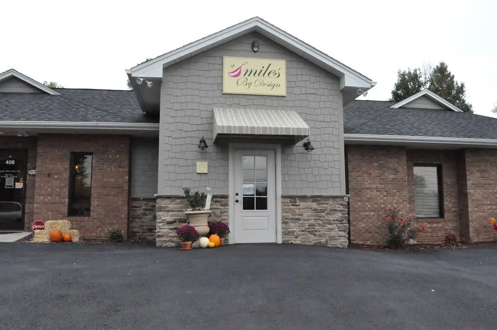 Smiles By Design - Professional dental clinic exterior with modern facilities