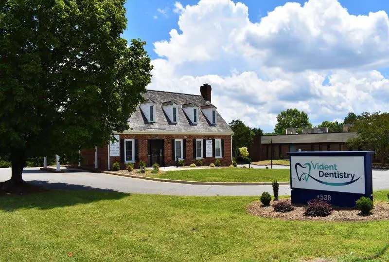 Vident Dentistry - Professional dental clinic exterior with modern facilities