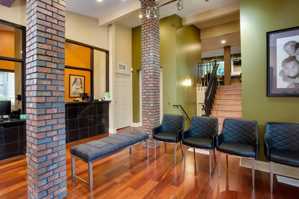 North Carolina Oral Surgery + Orthodontics - Greensboro - Professional dental clinic exterior with modern facilities