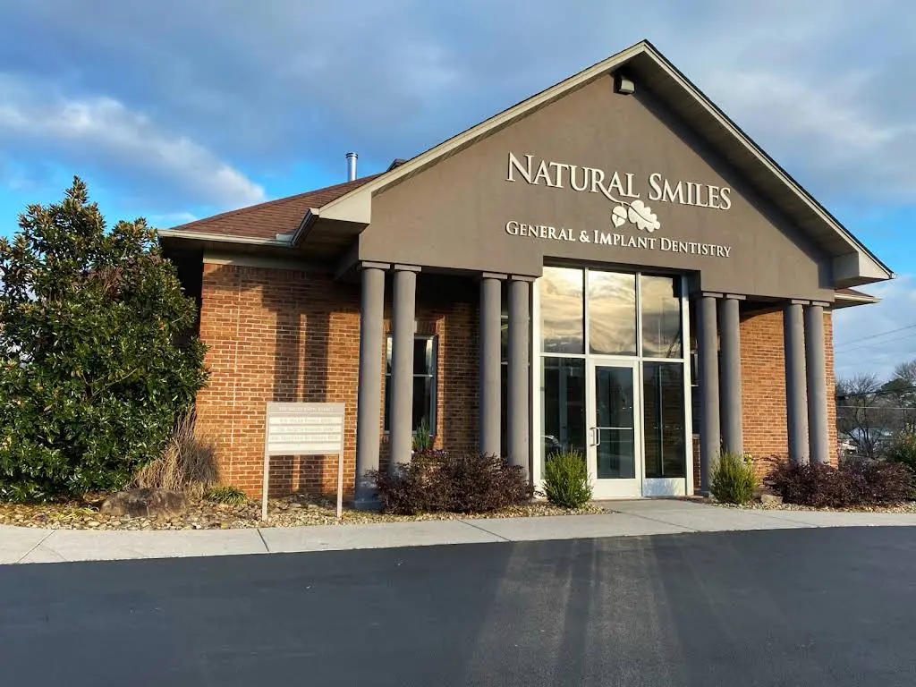 Natural Smiles - Professional dental clinic exterior with modern facilities