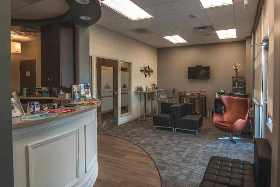New World Dentistry - Professional dental clinic exterior with modern facilities