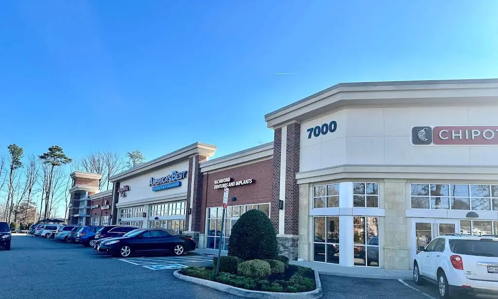 Richmond Dentures and Implants - Professional dental clinic exterior with modern facilities