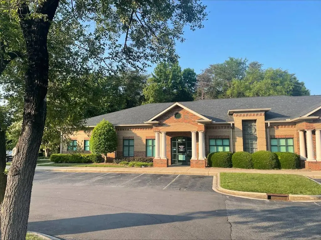 OrthoCare Orthodontics - Professional dental clinic exterior with modern facilities
