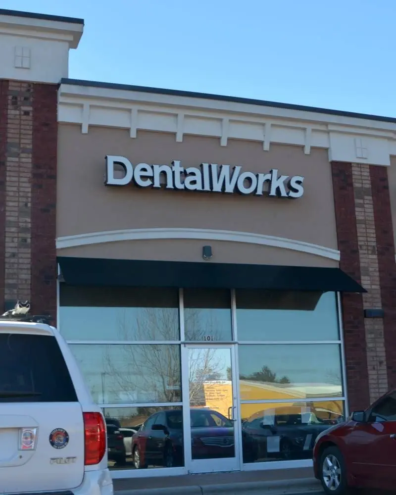 DentalWorks & Orthodontics - Professional dental clinic exterior with modern facilities