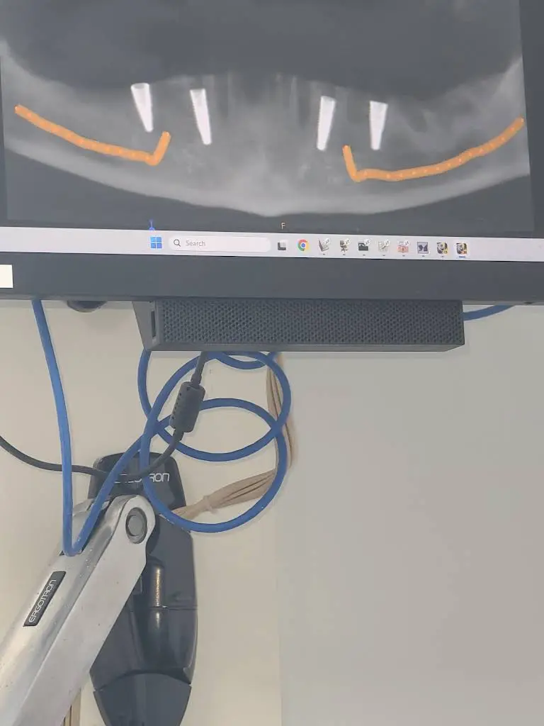 Affordable Dentures & Implants - Professional dental clinic exterior with modern facilities