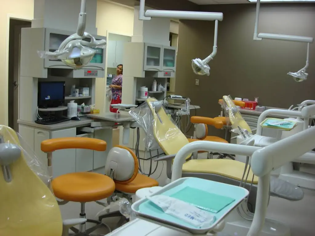 United Smiles - Professional dental clinic exterior with modern facilities