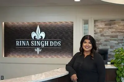 Rina Singh DDS / West Shore Smiles - Professional dental clinic exterior with modern facilities