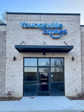 Youngsville Smiles - Professional dental clinic exterior with modern facilities