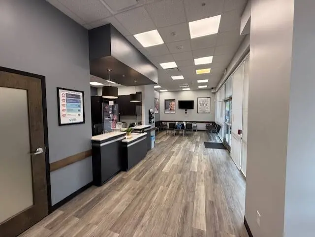 Affordable Dentures & Implants - Professional dental clinic exterior with modern facilities