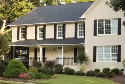Nu Image Surgical & Dental Implant Center - Professional dental clinic exterior with modern facilities