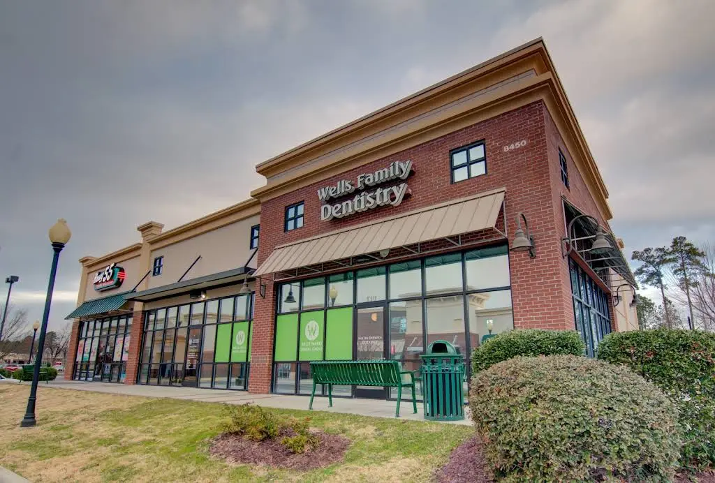 Wells Family Dental Group - Louisburg Road - Professional dental clinic exterior with modern facilities