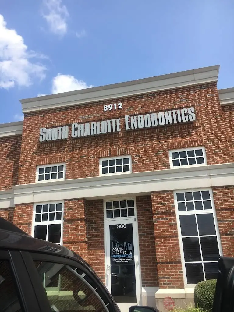 Queen City Endo - Professional dental clinic exterior with modern facilities