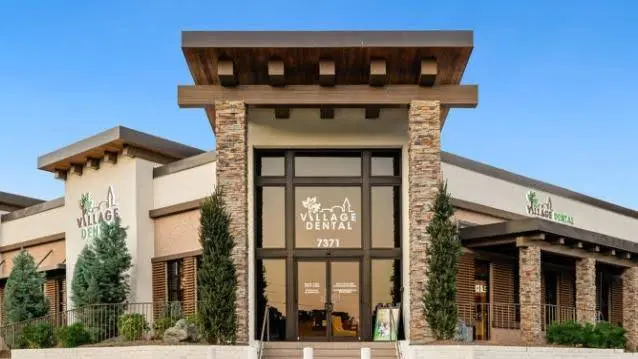 Village Dental - Brier Creek - Professional dental clinic exterior with modern facilities