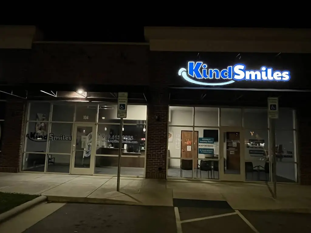Kind Smiles - Professional dental clinic exterior with modern facilities