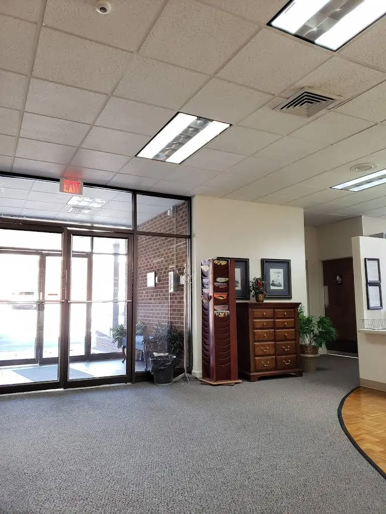Triangle Periodontics - Professional dental clinic exterior with modern facilities