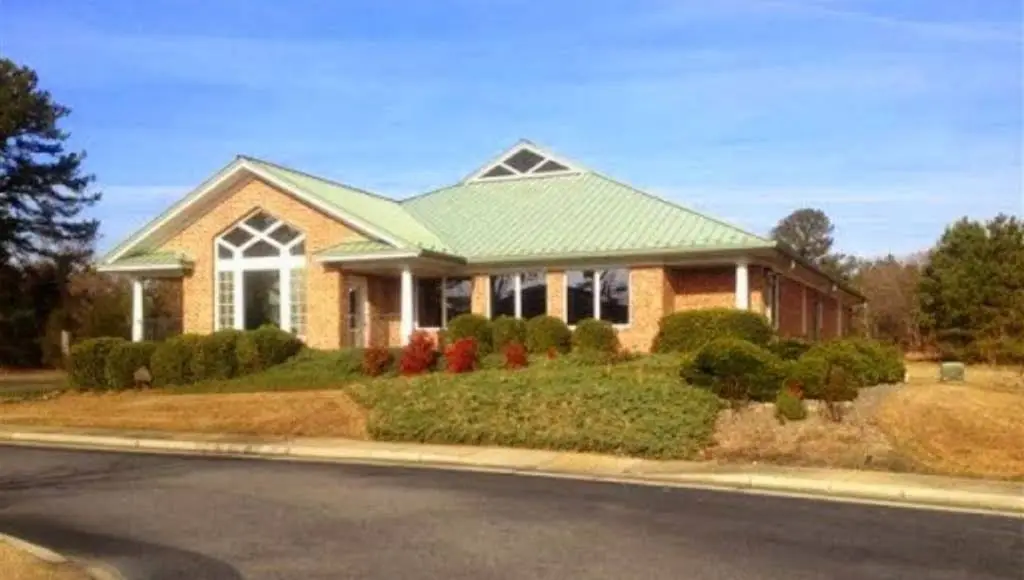 Smile Suffolk Braces: Dr. Taylor & Orthodontic Associates - Professional dental clinic exterior with modern facilities