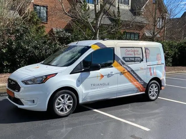 Triangle Mobile Dentistry - Professional dental clinic exterior with modern facilities