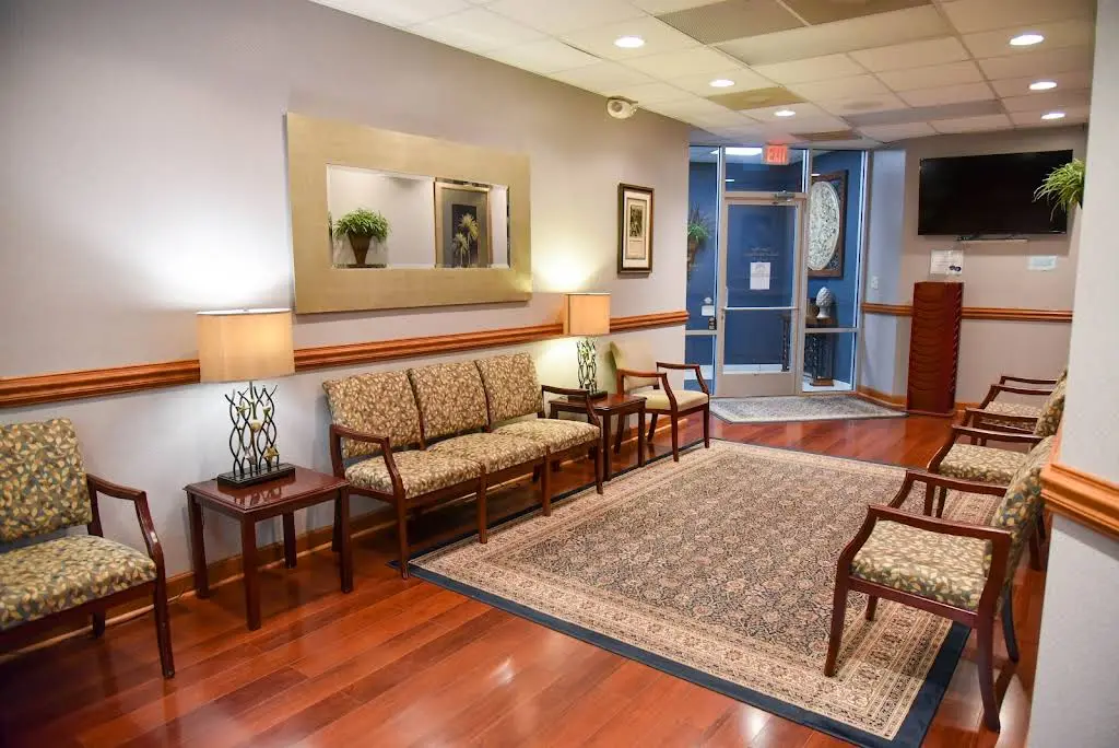 Oyster Point Oral & Facial Surgery - Professional dental clinic exterior with modern facilities